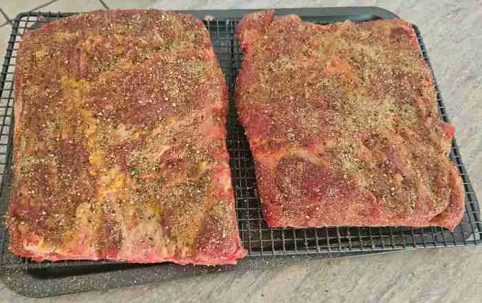 perfectly seasoned beef ribs ready to hit the smoker