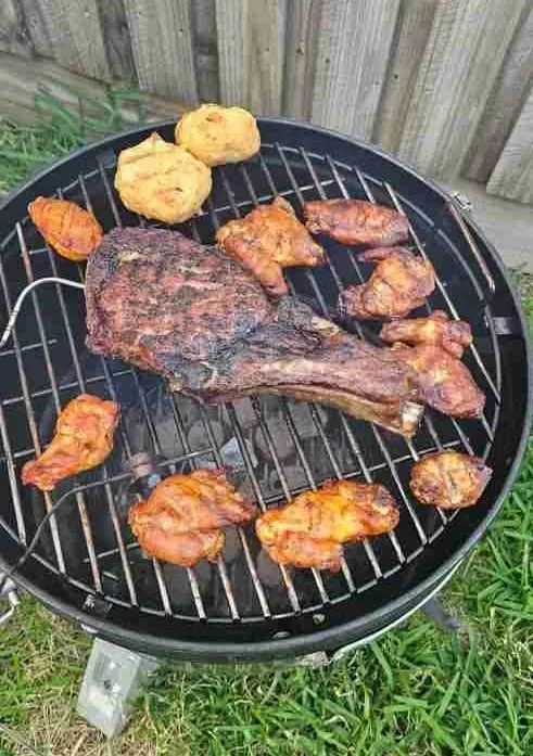tomahawkcharcoal Tomahawk Steak over charcoals