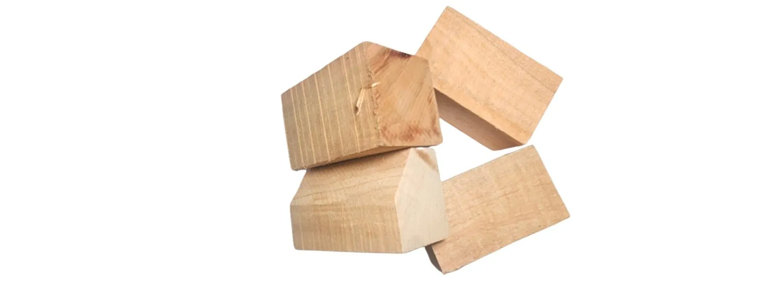 Cherry wood chunks for smoking and BBQ on a white background
